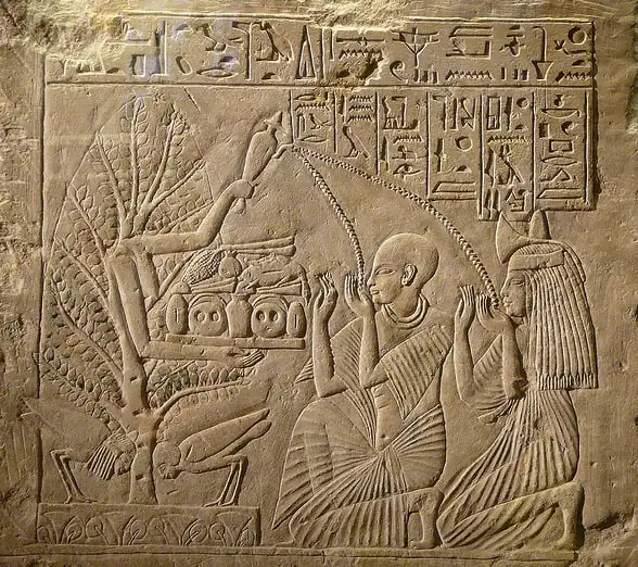 Egyptian engraving of a Tree of Life nourishing a couple, symbolizing fertility, prosperity, and divine connection