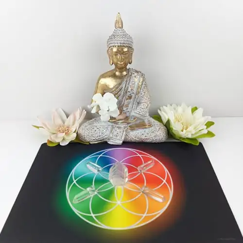 Rejilla de cristal dispuesta sobre una estera multicolor de Semilla de la Vida, utilizada para armonizar la energía y estimular la curación espiritual