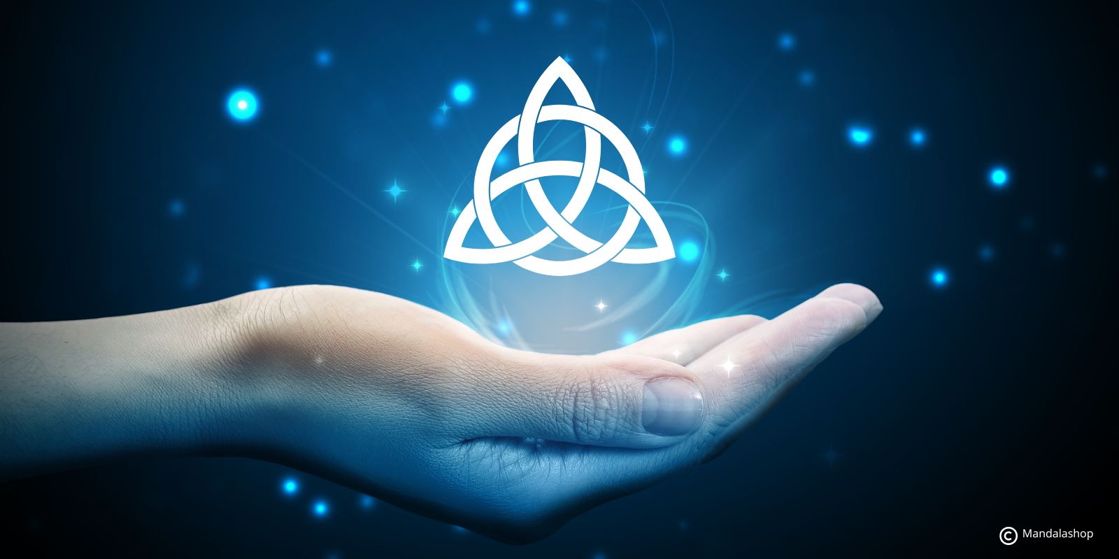 Triquetra symbol floating above the palm of a woman's hand, symbolizing inner wisdom